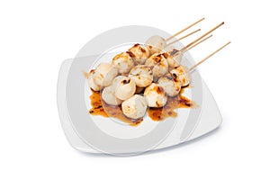 Grilled chicken meat ball with sweet spicy sauce isolated on white background