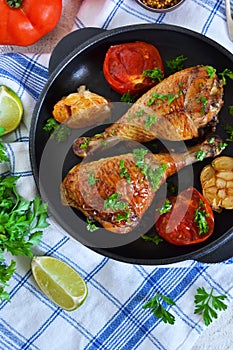 Grilled chicken with pesto and vegetables.