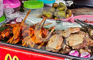 Grilled chicken on roadside