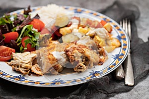 grilled chicken with salad and boiled rice in plate