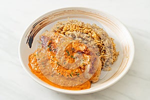 Grilled chicken steak with red curry sauce and rice