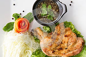 Grilled chicken with Thai style dipping spicy sauce for roasted or grilled food fish sauce and chilli