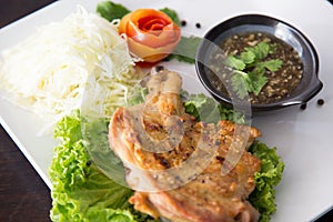 Grilled chicken with Thai style dipping spicy sauce for roasted or grilled food fish sauce and chilli