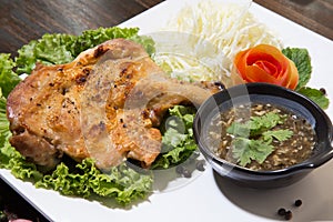 Grilled chicken with Thai style dipping spicy sauce for roasted or grilled food fish sauce and chilli