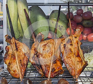 grilled chicken thai style on display street food shop in thaila