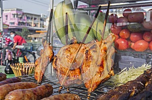 grilled chicken thai style on display street food shop in thaila