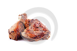 Grilled chicken thighs and drumsticks on a white background,isolated