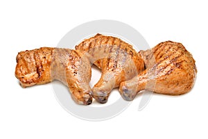 Grilled chicken thighs isolated on white background