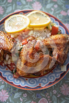 Grilled chicken wings with bulgur salad