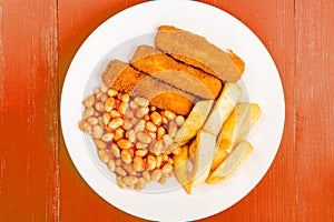 Grilled Cod Fish Fingers With Chunky Chips And Baked Beans in Tomato Sauce