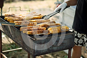 Grilled corn on barbeque brazier