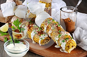 Grilled corn cobs photo