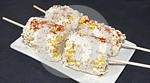 Grilled corn with Cotija cheese and spices