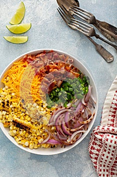 Grilled corn and jalapeno salad with cheese and bacon