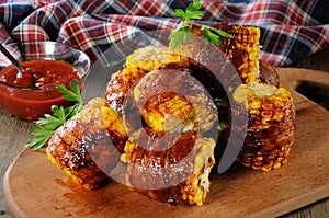 Grilled corn wrapped in bacon