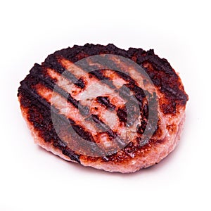 Grilled crocodile meat burger isolated on a white studio backgr