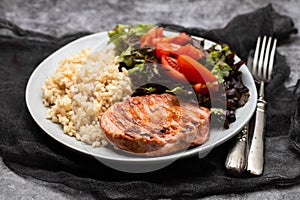 grilled cutlets burger with boiled rice and salad