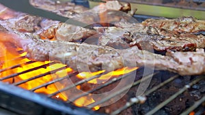 Grilled delicious lamb steaks over an open fire