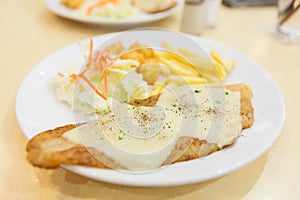 Grilled dolly fish steak meal served