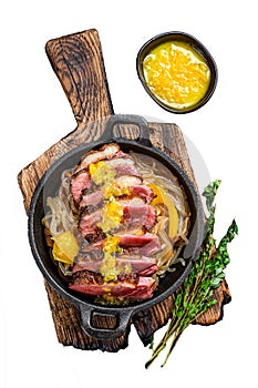 Grilled duck meat breast fillet steak with noodles and tangerines sauce. Isolated on white background, Top view.