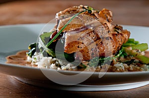 Grilled duck over wild rice