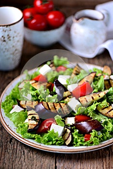 Grilled eggplant salad, tomatoes, feta and lettuce with olive oil and red balsamic, sea salt and pink pepper.