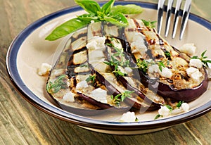 Grilled eggplant slices on a plate