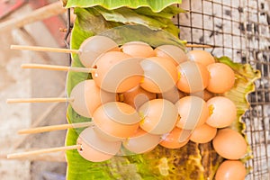 Grilled eggs for sale at local Thai market