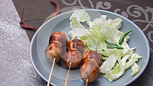 Grilled fermented pork and sticky rice sausage or Sausage Northeastern Style, What we call