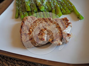 Grilled fillet with asparagus close up