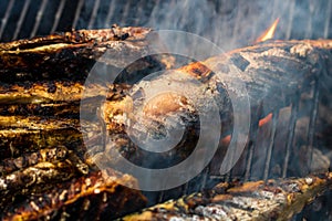 Grilled fish on charcoal grill. Fresh fish barbecue