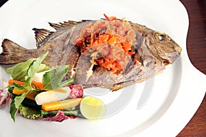 Grilled fish food portion