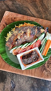 Grilled fish red hot chili sauce