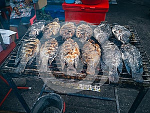 Grilled fish shop at local street market