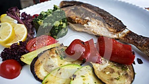 Grilled fish with various vegetables