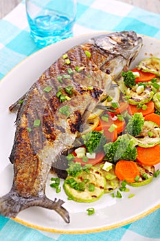 Grilled fish with vegetables