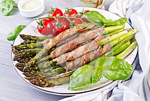 Grilled green asparagus wrapped with bacon