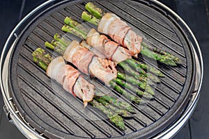 Grilled green asparagus wrapped with bacon