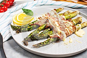 Grilled green asparagus wrapped with bacon. Ketogenic diet. Healthy food