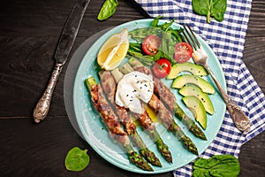 Grilled green asparagus wrapped with bacon, Plate with bacon wrapped asparagus salad. Food recipe background. space for text. top
