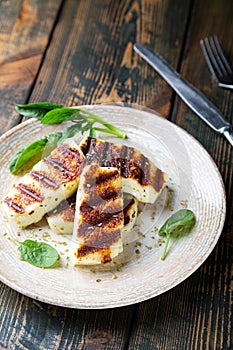 Grilled halloumi cheese with herbs photo
