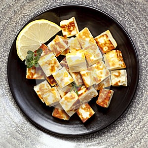 Grilled Halloumi Cheese with Lemon and Herbs.