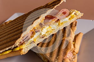 Grilled ham, cheese and egg panini