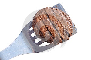 Grilled Hamburger Patty on a Spatula