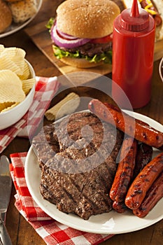 Grilled Hamburgers and Hot Dogs photo