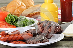 Grilled Hamburgers and Hotdogs photo