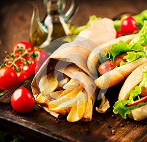 Grilled hot dogs on a picnic wooden table