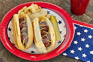 Grilled hotdogs at a patriotic cookout