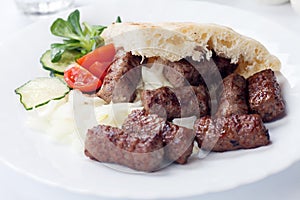 Grilled kebab with pita bread