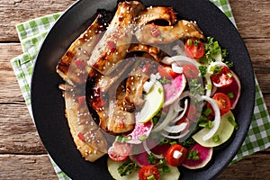 Grilled king oyster mushrooms and salad of radishes and tomatoes